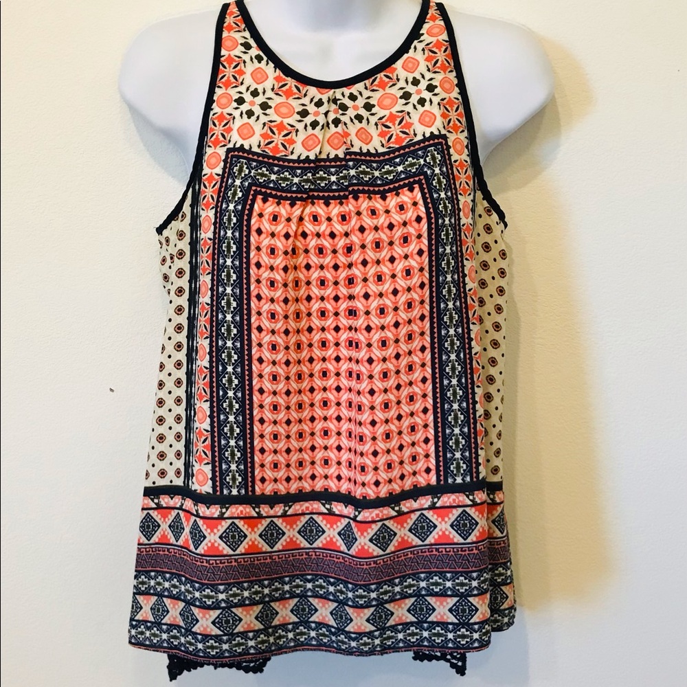 A. Buyer Sleeveless Pattern Blouse Size Small